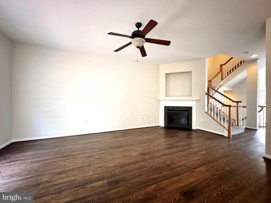 Empty room, Fireplace, Interior, Recessed Lighting, Wood Texture Flooring