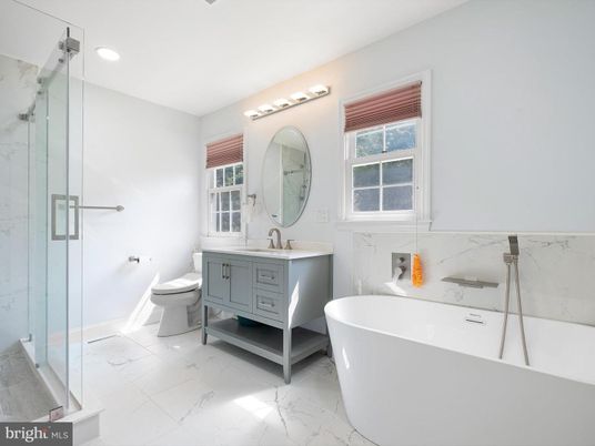 Bathroom, Dual Sink Vanities, Free Standing Baths, Glass Shower, Interior, Marble, Marble Walls, Recessed Lighting