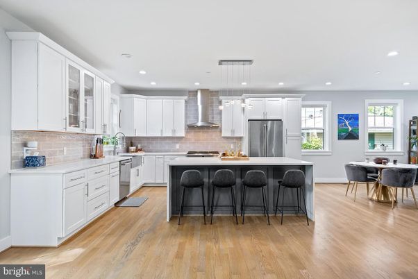 Dining room, Interior, Kitchen, Pendant Lights, Recessed Lighting, Stainless Steel Appliances, Wood Texture Flooring