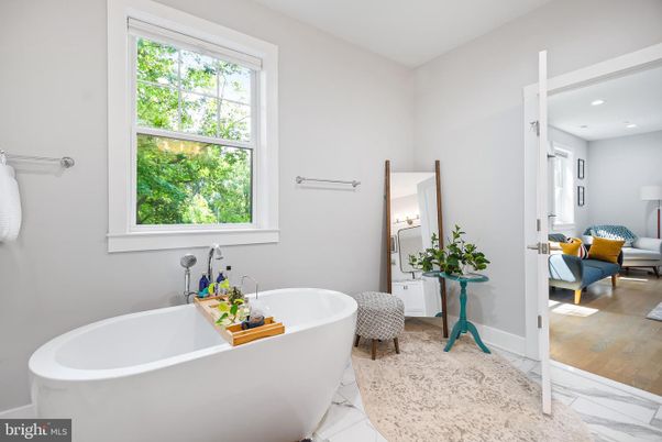 Bathroom, Free Standing Baths, Interior, Marble, Recessed Lighting, Wood Texture Flooring