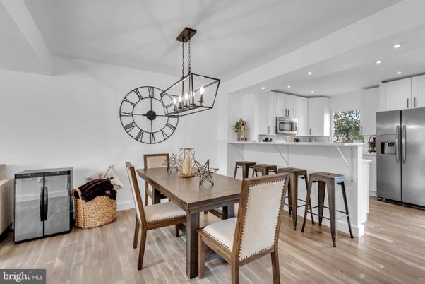 Dining room, Interior, Kitchen, Pendant Lights, Recessed Lighting, Stainless Steel Appliances, Wood Texture Flooring