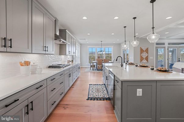 Dining room, Interior, Kitchen, Pendant Lights, Recessed Lighting, Stainless Steel Appliances, Wood Texture Flooring