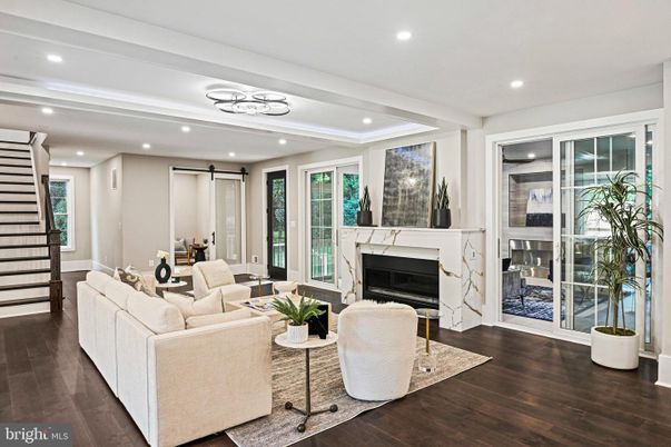 Dining room, Fireplace, Interior, Living room, Recessed Lighting, Wood Texture Flooring