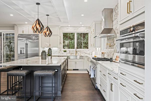 Interior, Kitchen, Marble Walls, Pendant Lights, Recessed Lighting, Stainless Steel Appliances, Wood Texture Flooring