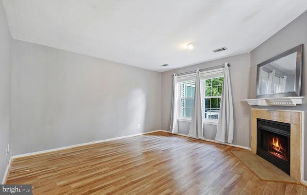 Empty room, Fireplace, Interior, Recessed Lighting, Wood Texture Flooring