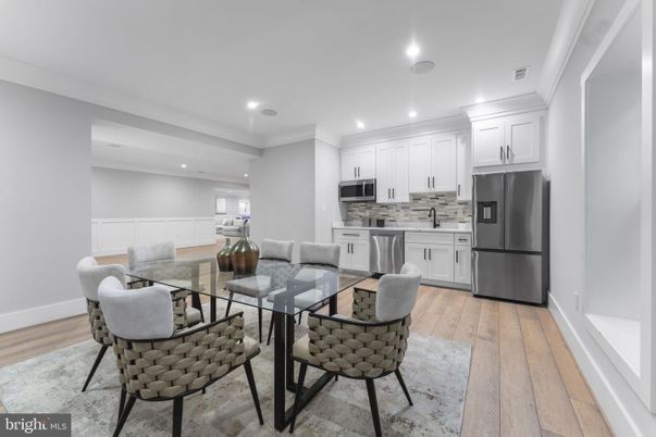 Dining room, Interior, Kitchen, Recessed Lighting, Stainless Steel Appliances, Wood Texture Flooring
