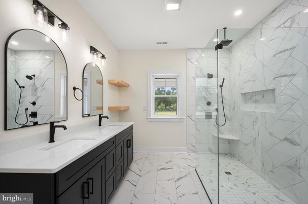 Bathroom, Dual Sink Vanities, Glass Shower, Interior, Marble, Marble Walls, Recessed Lighting