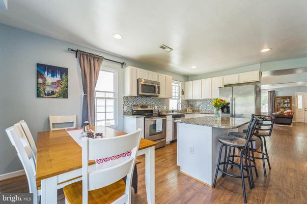 Dining room, Interior, Kitchen, Recessed Lighting, Stainless Steel Appliances, Wood Texture Flooring