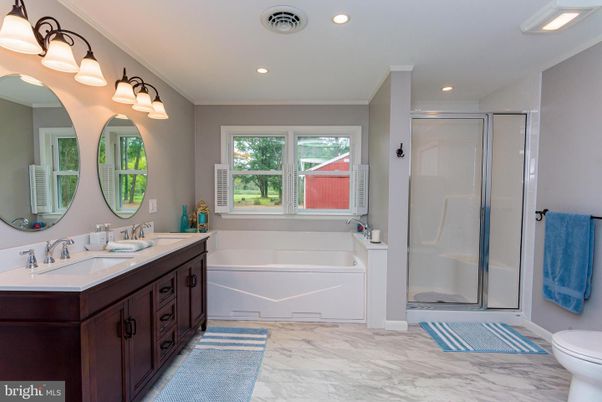 Bathroom, Dual Sink Vanities, Glass Shower, Interior, Marble, Recessed Lighting