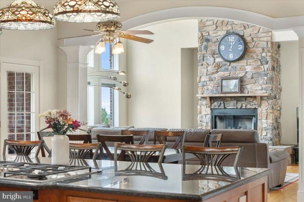 Dining room, Fireplace, Interior, Kitchen, Living room, Stone Walls, Wood Texture Flooring