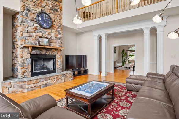 Fireplace, Interior, Living room, Pendant Lights, Stone Walls, Wood Texture Flooring