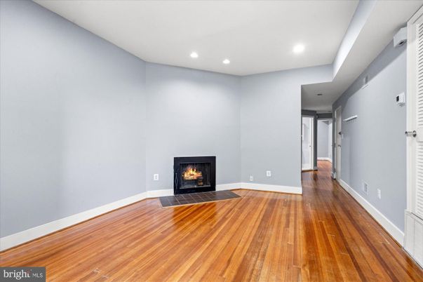 Empty room, Fireplace, Interior, Recessed Lighting, Wood Texture Flooring