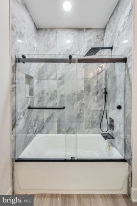Bathroom, Glass Shower, Interior, Marble Walls, Recessed Lighting, Wood Texture Flooring