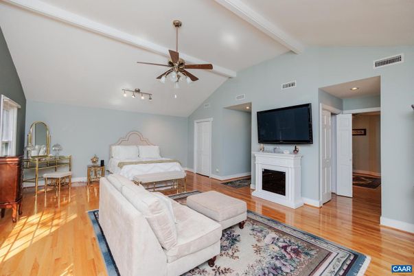 Bedroom, Fireplace, Interior, Recessed Lighting, Wood Texture Flooring
