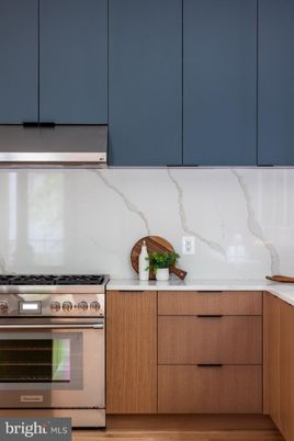 Interior, Kitchen, Marble Walls, Stainless Steel Appliances, Wood Texture Flooring
