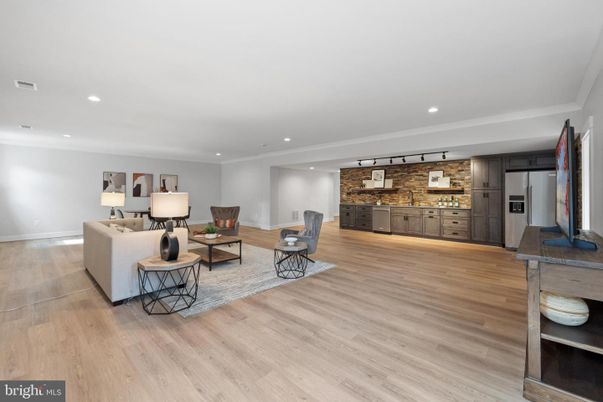 Interior, Kitchen, Living room, Recessed Lighting, Stainless Steel Appliances, Stone Walls, Wood Texture Flooring