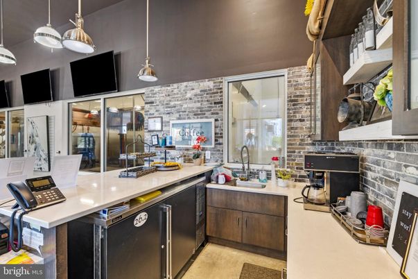 Interior, Kitchen, Pendant Lights, Stainless Steel Appliances, Stone Walls