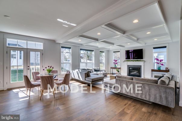 Dining room, Fireplace, Interior, Living room, Recessed Lighting, Wood Texture Flooring