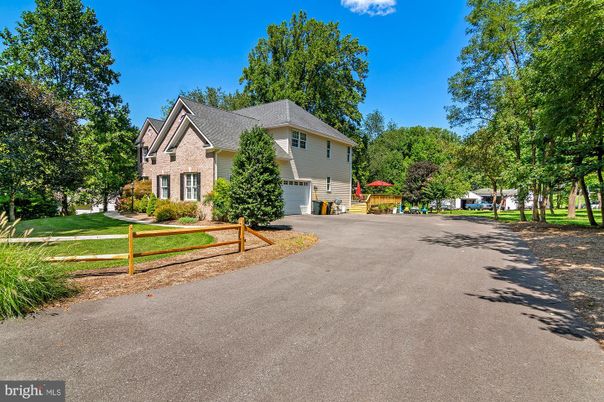 Attached, Backyard, Exterior, Facade, Brick Facade, French Provincial