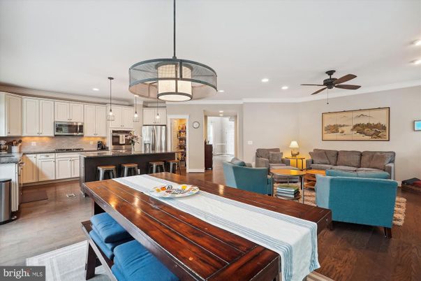 Dining room, Interior, Kitchen, Living room, Pendant Lights, Recessed Lighting, Stainless Steel Appliances, Wood Texture Flooring