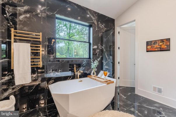 Bathroom, Free Standing Baths, Glass Shower, Interior, Marble, Marble Walls, Recessed Lighting