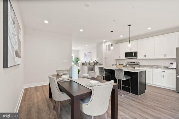 Dining room, Interior, Kitchen, Pendant Lights, Recessed Lighting, Stainless Steel Appliances, Wood Texture Flooring