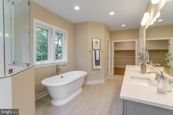 Bathroom, Dual Sink Vanities, Free Standing Baths, Interior, Recessed Lighting, Walk-in Closets, Wood Texture Flooring