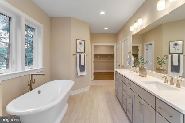 Bathroom, Dual Sink Vanities, Free Standing Baths, Interior, Recessed Lighting, Walk-in Closets, Wood Texture Flooring