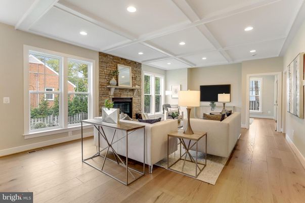 Fireplace, Interior, Living room, Recessed Lighting, Stone Walls, Wood Texture Flooring