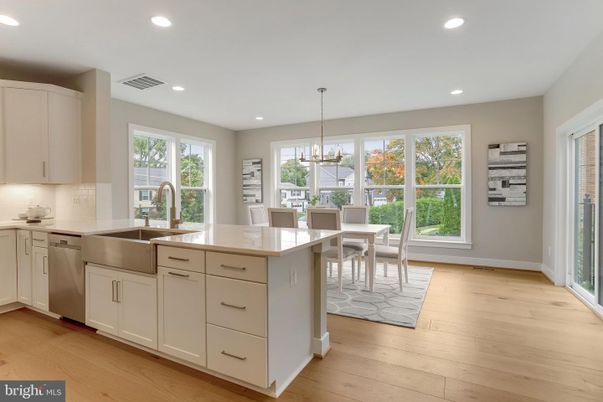 Chandelier, Dining room, Interior, Kitchen, Pendant Lights, Recessed Lighting, Stainless Steel Appliances, Wood Texture Flooring