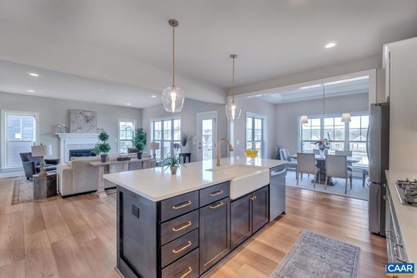 Dining room, Fireplace, Interior, Kitchen, Living room, Pendant Lights, Recessed Lighting, Stainless Steel Appliances, Wood Texture Flooring