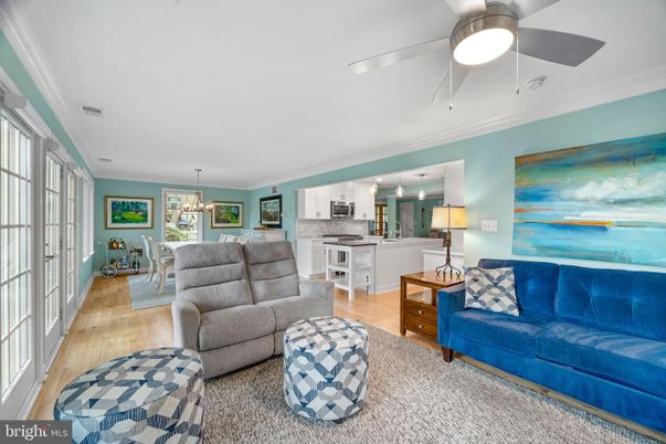 Chandelier, Dining room, Interior, Kitchen, Living room, Pendant Lights, Stainless Steel Appliances, Wood Texture Flooring