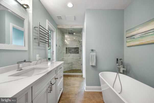 Bathroom, Dual Sink Vanities, Free Standing Baths, Glass Shower, Interior, Marble Walls, Recessed Lighting