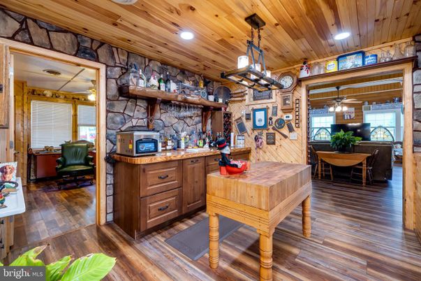 Dining room, Interior, Pendant Lights, Recessed Lighting, Stone Walls, Wooden Ceilings, Wood Texture Flooring