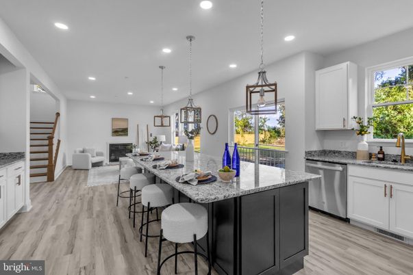 Dining room, Fireplace, Interior, Kitchen, Living room, Pendant Lights, Recessed Lighting, Stainless Steel Appliances, Wood Texture Flooring