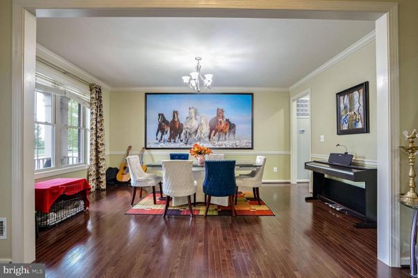 Chandelier, Dining room, Interior, Piano, Wood Texture Flooring