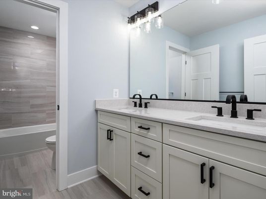 Bathroom, Dual Sink Vanities, Interior, Recessed Lighting, Wood Texture Flooring