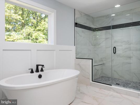 Bathroom, Free Standing Baths, Glass Shower, Interior, Marble, Marble Walls, Recessed Lighting