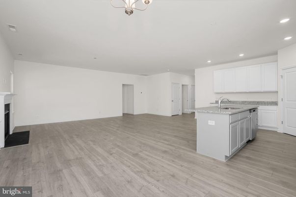 Fireplace, Interior, Kitchen, Recessed Lighting, Wood Texture Flooring