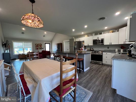Dining room, Interior, Kitchen, Living room, Pendant Lights, Recessed Lighting, Stainless Steel Appliances, Wood Texture Flooring