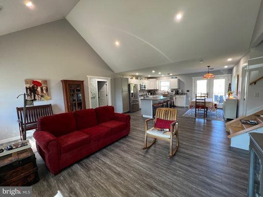 Chandelier, Dining room, Interior, Kitchen, Living room, Recessed Lighting, Stainless Steel Appliances, Wood Texture Flooring