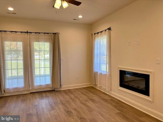 Empty room, Fireplace, Interior, Recessed Lighting, Wood Texture Flooring