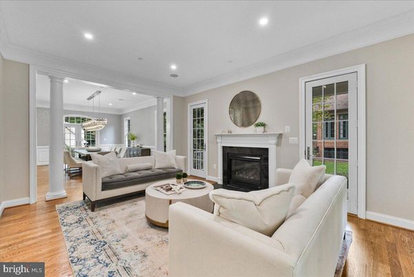 Chandelier, Dining room, Fireplace, Interior, Living room, Pendant Lights, Recessed Lighting, Wood Texture Flooring