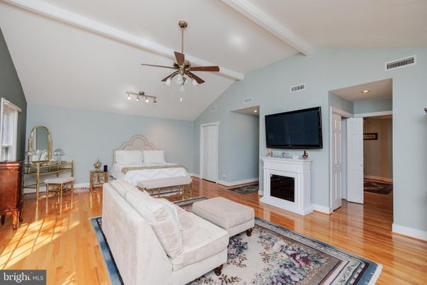 Bedroom, Fireplace, Interior, Recessed Lighting, Wood Texture Flooring
