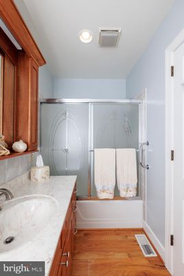 Bathroom, Glass Shower, Interior, Recessed Lighting, Wood Texture Flooring