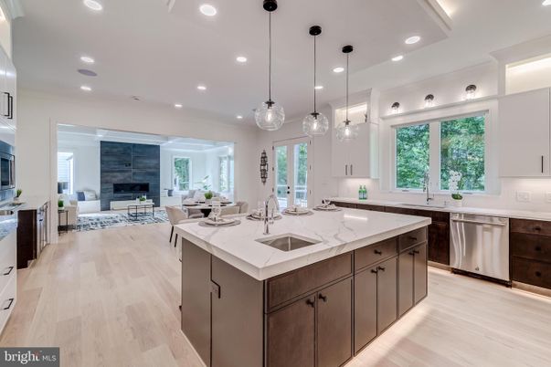 Dining room, Fireplace, Interior, Kitchen, Living room, Pendant Lights, Recessed Lighting, Stainless Steel Appliances, Wood Texture Flooring