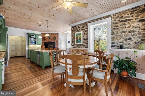 Dining room, Fireplace, Interior, Kitchen, Pendant Lights, Recessed Lighting, Stone Walls, Wooden Ceilings, Wood Texture Flooring