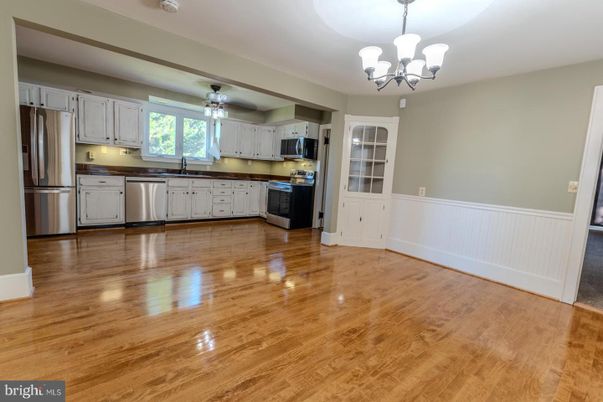 Chandelier, Empty room, Interior, Kitchen, Stainless Steel Appliances, Wood Texture Flooring