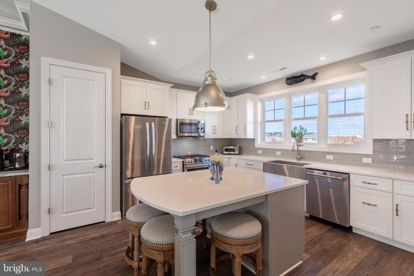 Interior, Kitchen, Pendant Lights, Recessed Lighting, Stainless Steel Appliances, Wood Texture Flooring