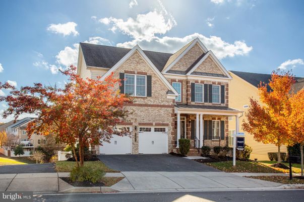 Attached, Exterior, Facade, Brick Traditional